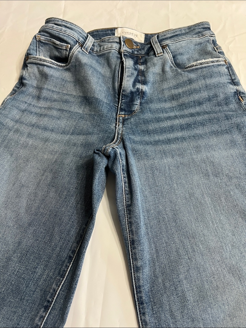 Evereve Medium Wash Straight Leg Jeans with slight flare at the bottom